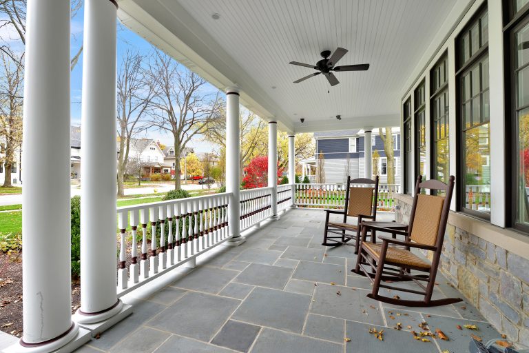 This is an example of a large victorian tile front porch design in Chicago with a roof extension. by Jeremy Lew & Assoc., Inc. | Outdoor Photos | Porch | Landscaping | Landscape Design | Outdoor Living Space | Porch Design Ideas | Outdoor Living Space Ideas | Backyard Design