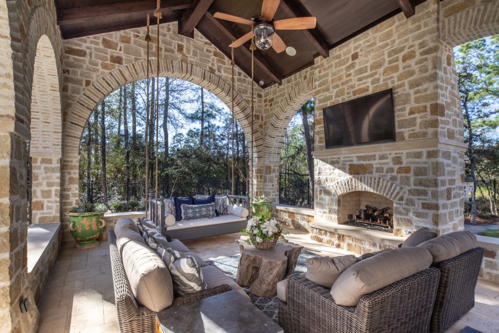 This is an example of a mediterranean porch design in Houston with a fireplace. by Allan Edwards Builder Inc. | Outdoor Photos | Porch | Landscaping | Landscape Design | Outdoor Living Space | Porch Design Ideas | Outdoor Living Space Ideas | Backyard Design