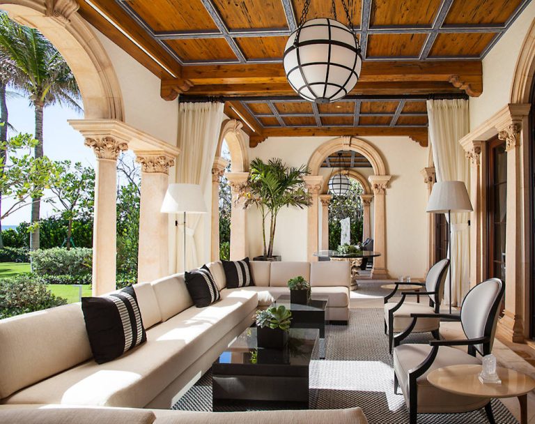 This is an example of a mediterranean porch design in Miami with a roof extension. by Wittmann Building Corp | Outdoor Photos | Porch | Landscaping | Landscape Design | Outdoor Living Space | Porch Design Ideas | Outdoor Living Space Ideas | Backyard Design