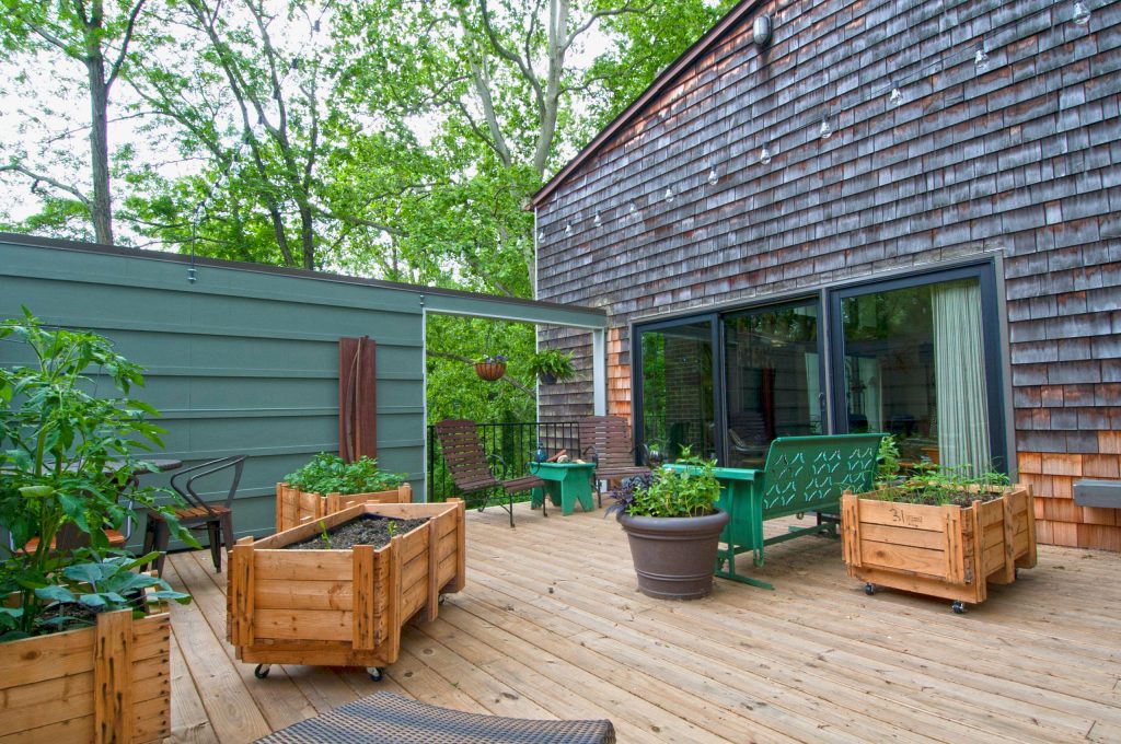 This is an example of a mid-century modern porch design in Columbus. by Rogers Krajnak Architects | Outdoor Photos | Porch | Landscaping | Landscape Design | Outdoor Living Space | Porch Design Ideas | Outdoor Living Space Ideas | Backyard Design