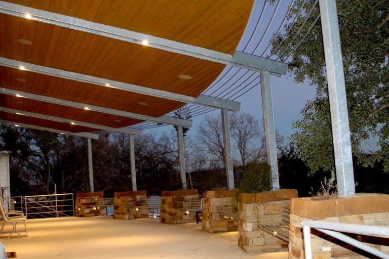 This is an example of a mid-sized back porch design in Austin with a roof extension. by Double T Homes Builders LLC | Outdoor Photos | Porch | Landscaping | Landscape Design | Outdoor Living Space | Porch Design Ideas | Outdoor Living Space Ideas | Backyard Design