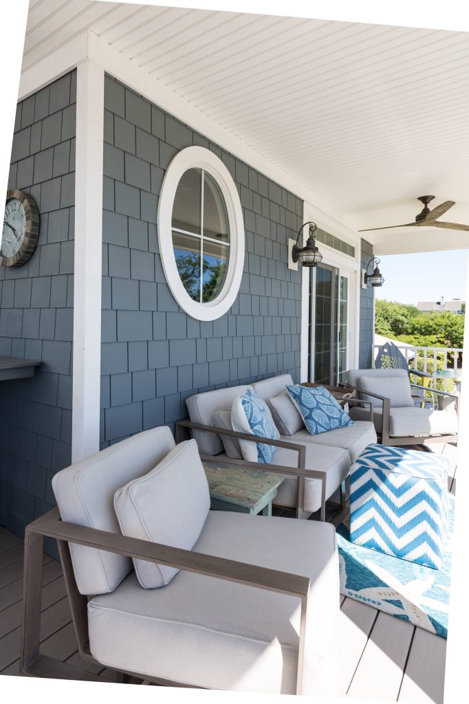 This is an example of a mid-sized coastal front porch design in Other with decking and a roof extension. by VB Homes Design, Build, Remodel | Outdoor Photos | Porch | Landscaping | Landscape Design | Outdoor Living Space | Porch Design Ideas | Outdoor Living Space Ideas | Backyard Design