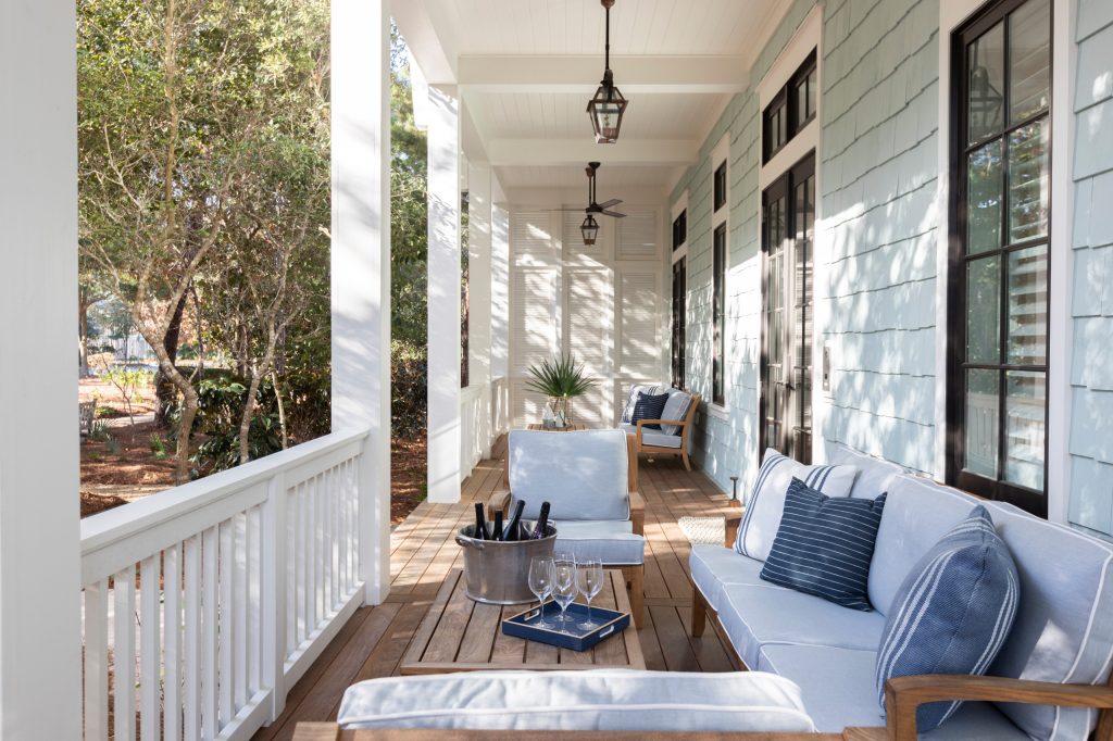 This is an example of a mid-sized coastal wood railing porch design in Other with decking and a roof extension. by Geoff Chick & Associates | Outdoor Photos | Porch | Landscaping | Landscape Design | Outdoor Living Space | Porch Design Ideas | Outdoor Living Space Ideas | Backyard Design
