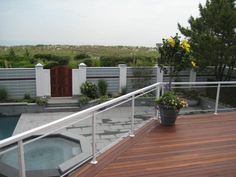 This is an example of a mid-sized contemporary back porch design in New York with decking. by Duke of Iron | Outdoor Photos | Porch | Landscaping | Landscape Design | Outdoor Living Space | Porch Design Ideas | Outdoor Living Space Ideas | Backyard Design