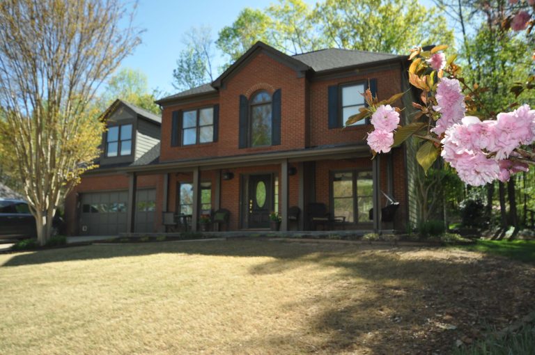 This is an example of a mid-sized contemporary tile front porch design in Atlanta with a roof extension. by Taber Residential | Outdoor Photos | Porch | Landscaping | Landscape Design | Outdoor Living Space | Porch Design Ideas | Outdoor Living Space Ideas | Backyard Design