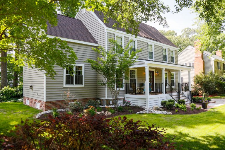 This is an example of a mid-sized cottage front porch design in Other with a roof extension. by J.M. Froehler Construction | Outdoor Photos | Porch | Landscaping | Landscape Design | Outdoor Living Space | Porch Design Ideas | Outdoor Living Space Ideas | Backyard Design
