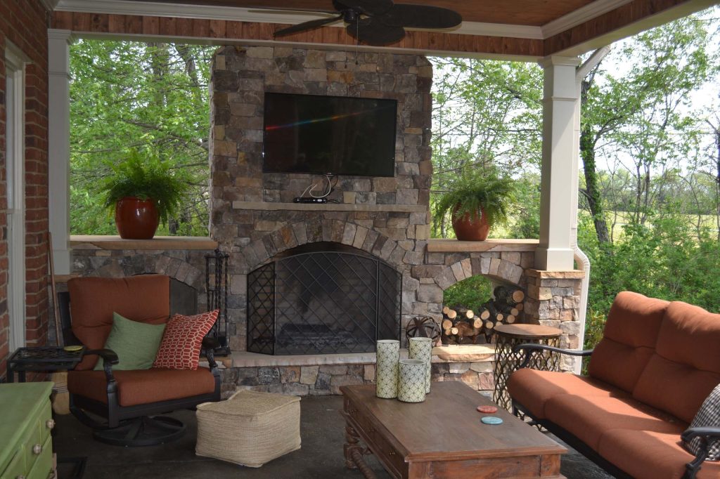 This is an example of a mid-sized cottage stamped concrete back porch design in Nashville with a roof extension. by Holmes By Design | Outdoor Photos | Porch | Landscaping | Landscape Design | Outdoor Living Space | Porch Design Ideas | Outdoor Living Space Ideas | Backyard Design