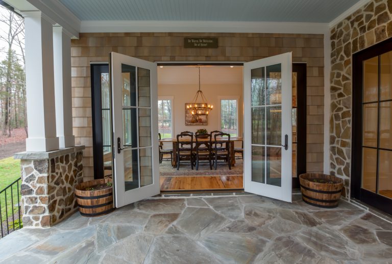 This is an example of a mid-sized cottage stone back porch design in Charlotte with a roof extension. by Circle Construction Services | Outdoor Photos | Porch | Landscaping | Landscape Design | Outdoor Living Space | Porch Design Ideas | Outdoor Living Space Ideas | Backyard Design