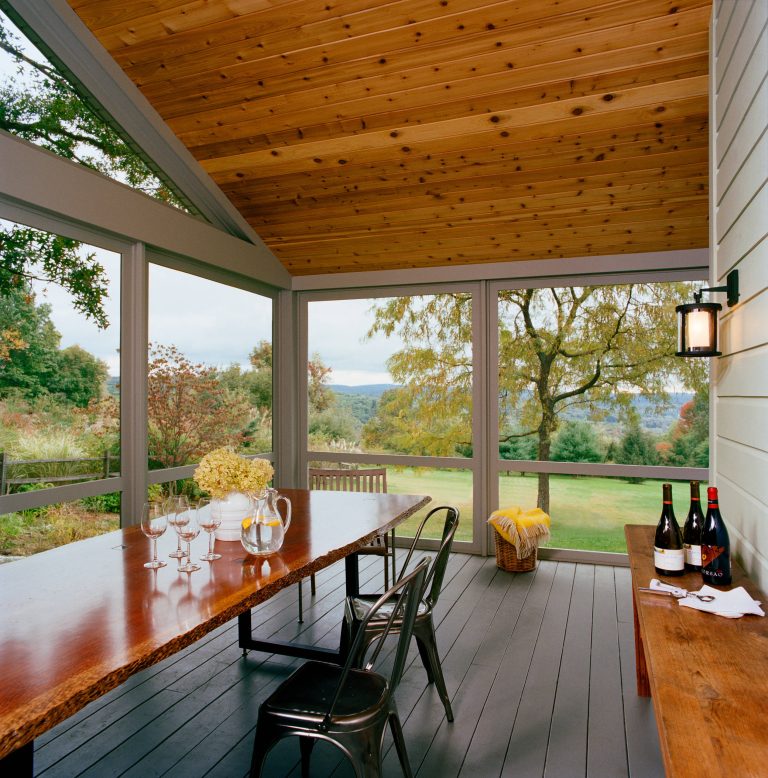 This is an example of a mid-sized country screened-in back porch design in Boston with decking and a roof extension. by Platt Dana Architects | Outdoor Photos | Porch | Landscaping | Landscape Design | Outdoor Living Space | Porch Design Ideas | Outdoor Living Space Ideas | Backyard Design