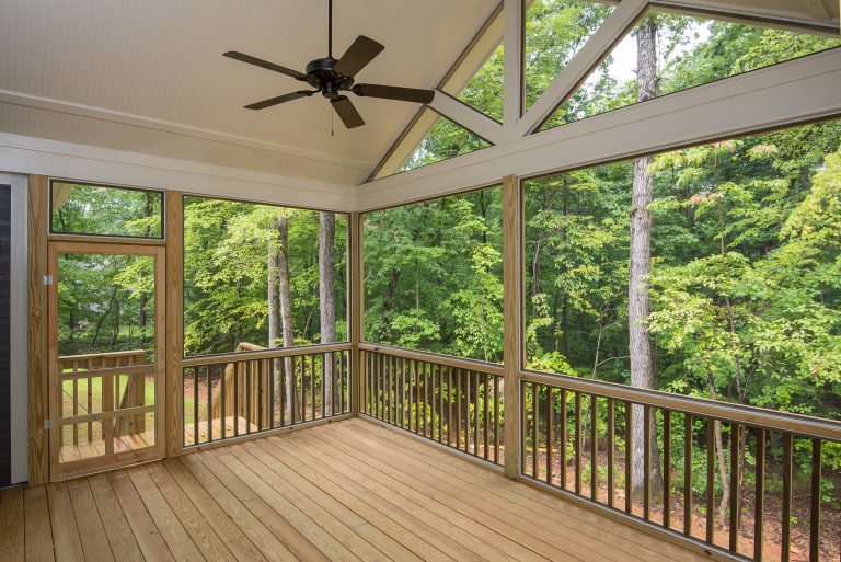 This is an example of a mid-sized craftsman concrete screened-in front porch design in Raleigh with a roof extension. by Grayson Dare Homes, Inc. | Outdoor Photos | Porch | Landscaping | Landscape Design | Outdoor Living Space | Porch Design Ideas | Outdoor Living Space Ideas | Backyard Design