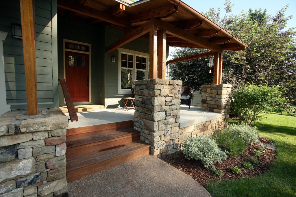 This is an example of a mid-sized craftsman front porch design in Other with a roof extension. by rc3 Inc. | Outdoor Photos | Porch | Landscaping | Landscape Design | Outdoor Living Space | Porch Design Ideas | Outdoor Living Space Ideas | Backyard Design