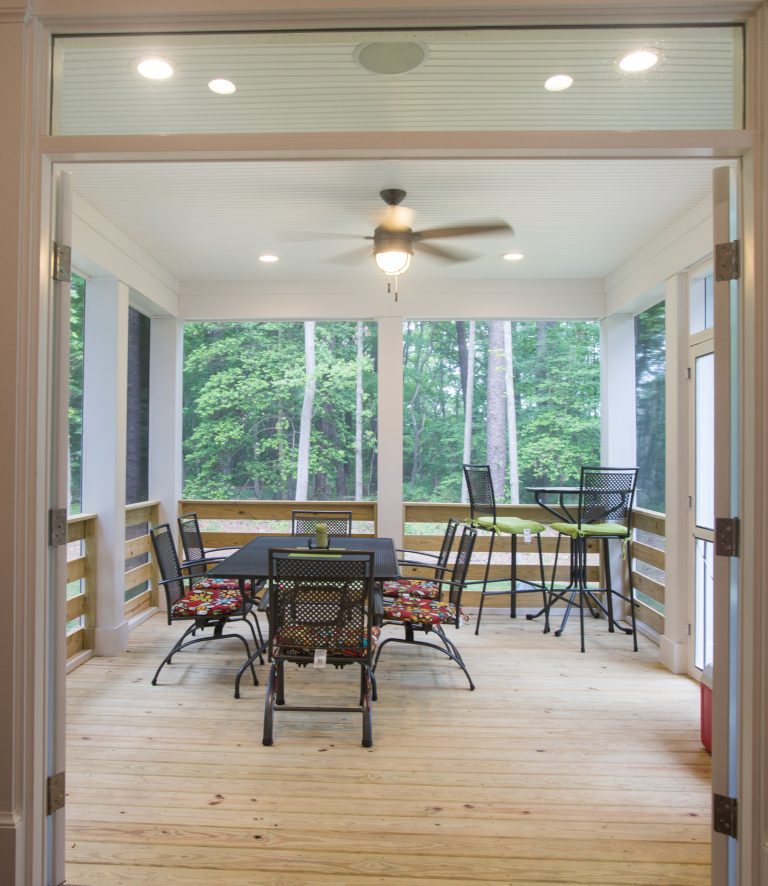 This is an example of a mid-sized craftsman screened-in back porch design in Other with decking and a roof extension. by J.M. Froehler Construction | Outdoor Photos | Porch | Landscaping | Landscape Design | Outdoor Living Space | Porch Design Ideas | Outdoor Living Space Ideas | Backyard Design