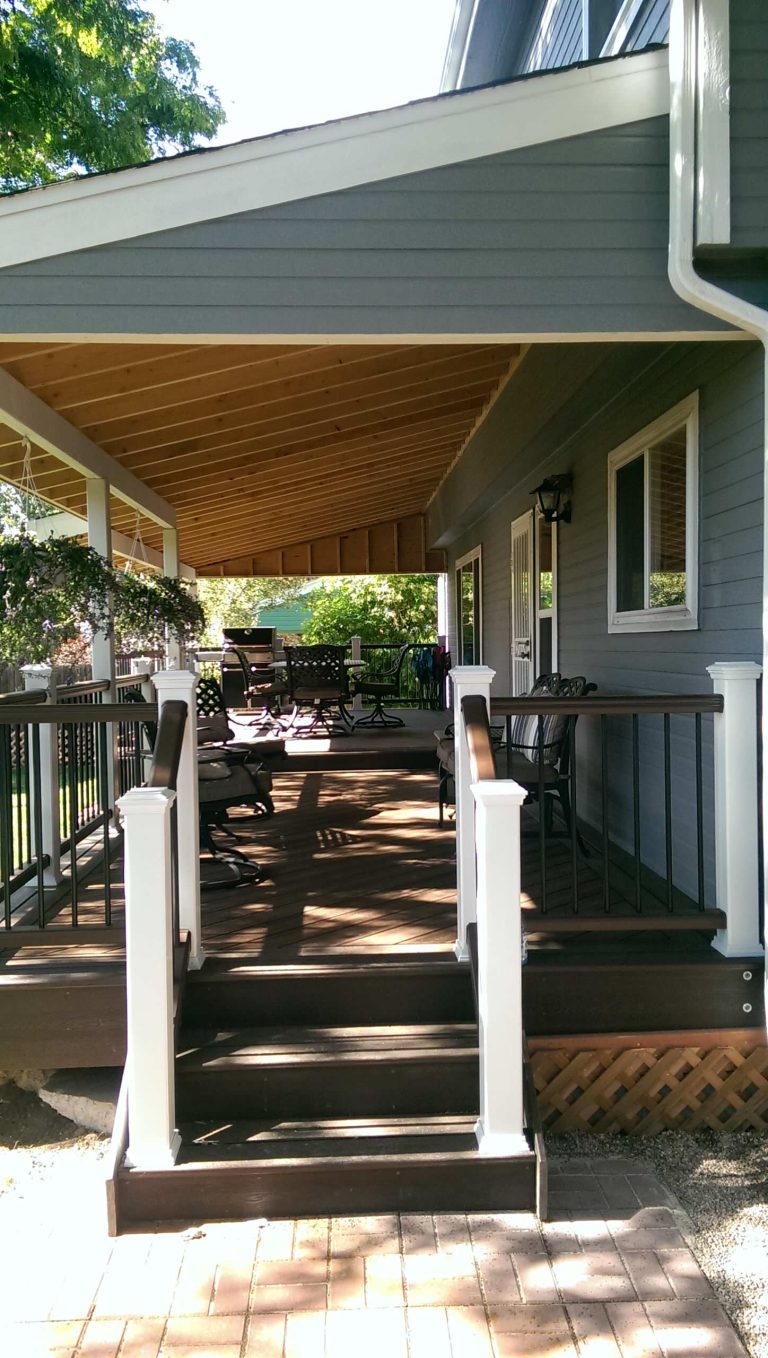 This is an example of a mid-sized farmhouse porch design in Denver. by Custom Decks & Concrete | Outdoor Photos | Porch | Landscaping | Landscape Design | Outdoor Living Space | Porch Design Ideas | Outdoor Living Space Ideas | Backyard Design