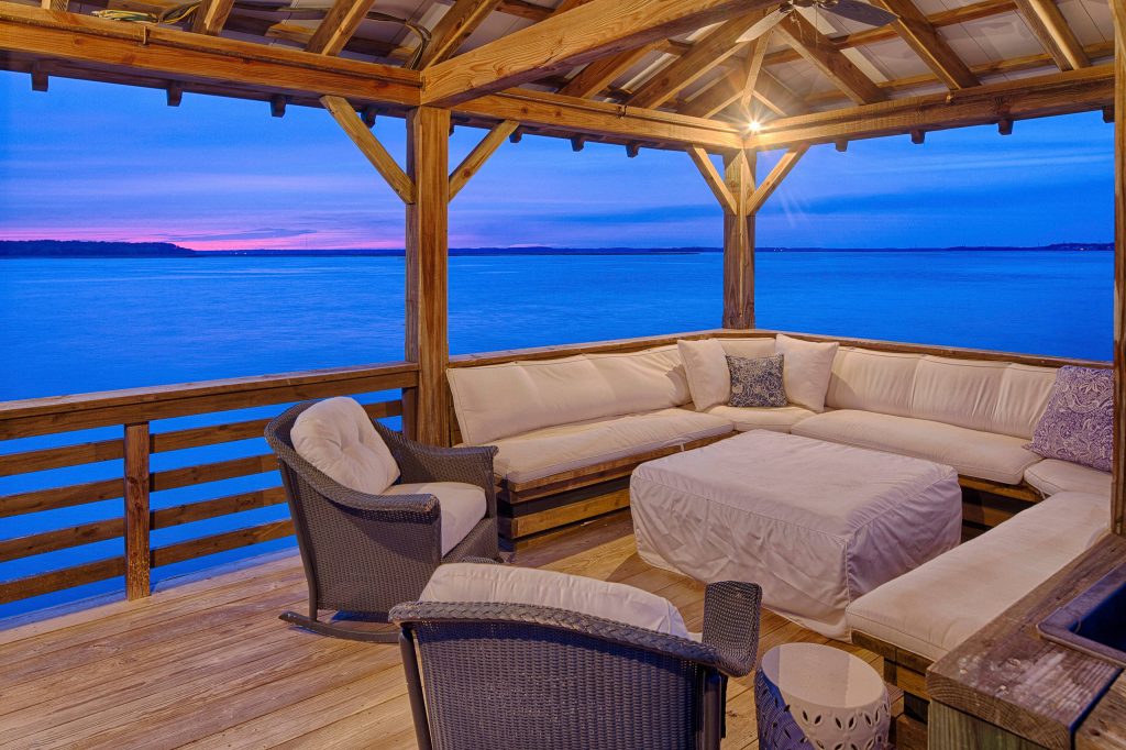 This is an example of a mid-sized mediterranean back porch design in Atlanta with a roof extension and decking. by Randolph Stewart | Outdoor Photos | Porch | Landscaping | Landscape Design | Outdoor Living Space | Porch Design Ideas | Outdoor Living Space Ideas | Backyard Design