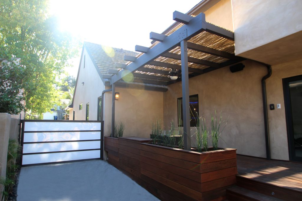 This is an example of a mid-sized modern porch design in Los Angeles with decking and a pergola. by Spazio LA | Outdoor Photos | Porch | Landscaping | Landscape Design | Outdoor Living Space | Porch Design Ideas | Outdoor Living Space Ideas | Backyard Design