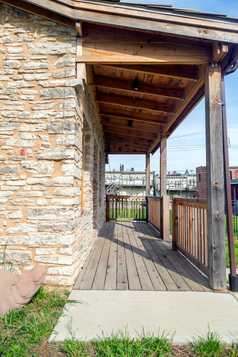 This is an example of a mid-sized rustic concrete front porch design in St Louis with a roof extension. by Killeen Studio Architects | Outdoor Photos | Porch | Landscaping | Landscape Design | Outdoor Living Space | Porch Design Ideas | Outdoor Living Space Ideas | Backyard Design