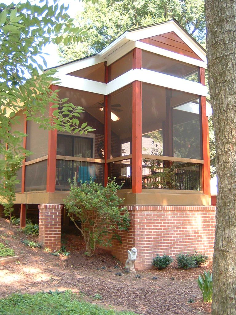 This is an example of a mid-sized rustic screened-in back porch design in Atlanta with a roof extension. by William Sisk Designs | Outdoor Photos | Porch | Landscaping | Landscape Design | Outdoor Living Space | Porch Design Ideas | Outdoor Living Space Ideas | Backyard Design