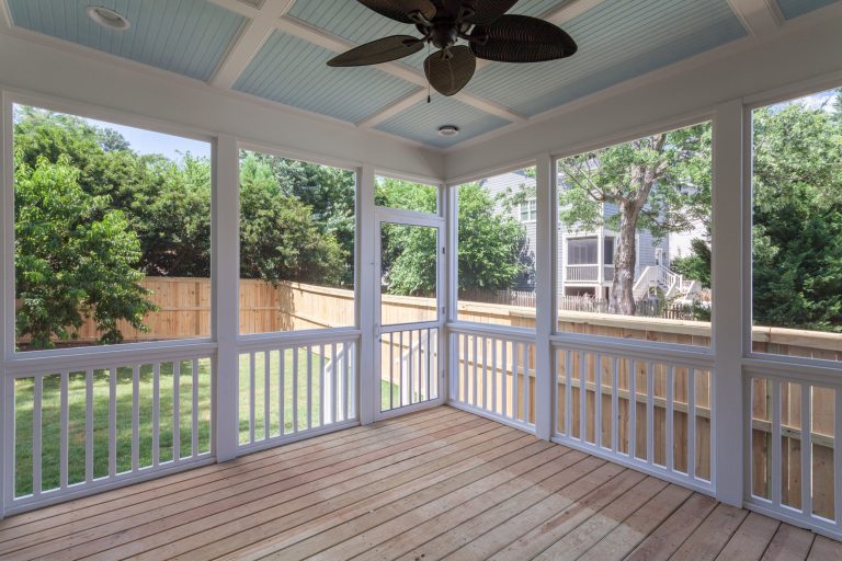 This is an example of a mid-sized screened-in back porch design in Raleigh with decking and a roof extension. by Davenport and Anderson Homes | Outdoor Photos | Porch | Landscaping | Landscape Design | Outdoor Living Space | Porch Design Ideas | Outdoor Living Space Ideas | Backyard Design