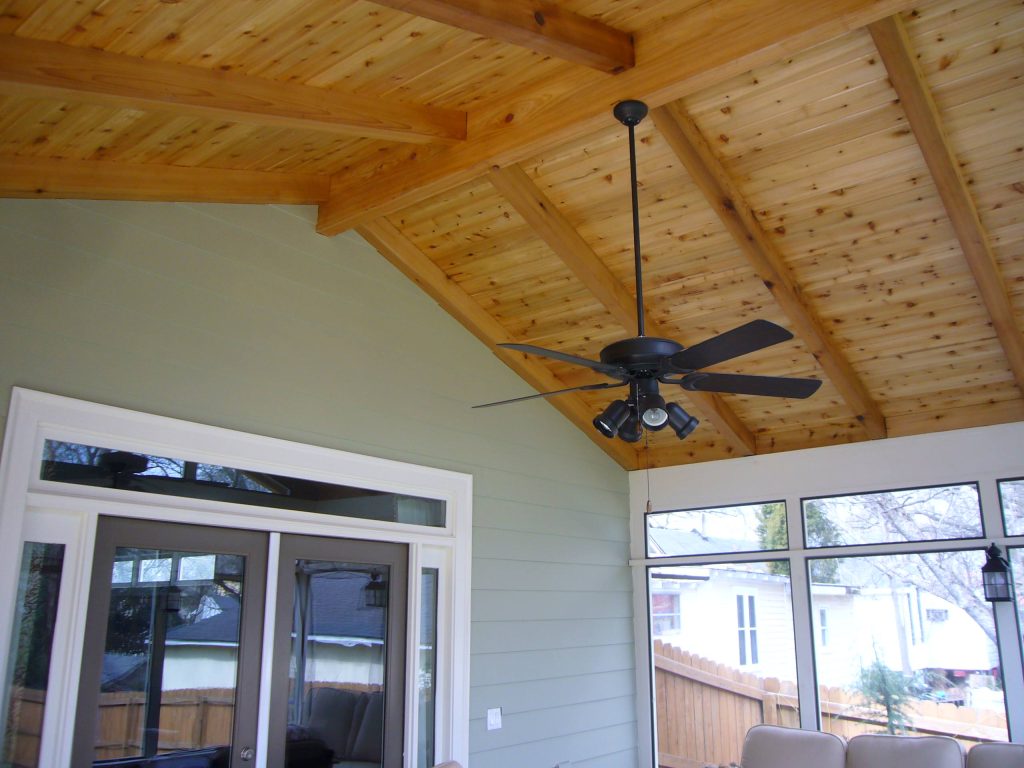 This is an example of a mid-sized traditional back porch design in Atlanta with a roof extension. by Synergy Outdoor | Outdoor Photos | Porch | Landscaping | Landscape Design | Outdoor Living Space | Porch Design Ideas | Outdoor Living Space Ideas | Backyard Design