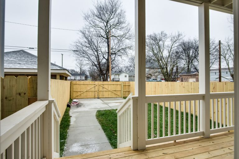This is an example of a mid-sized traditional back porch design in Nashville with decking and a roof extension. by White Pines Building Group | Outdoor Photos | Porch | Landscaping | Landscape Design | Outdoor Living Space | Porch Design Ideas | Outdoor Living Space Ideas | Backyard Design