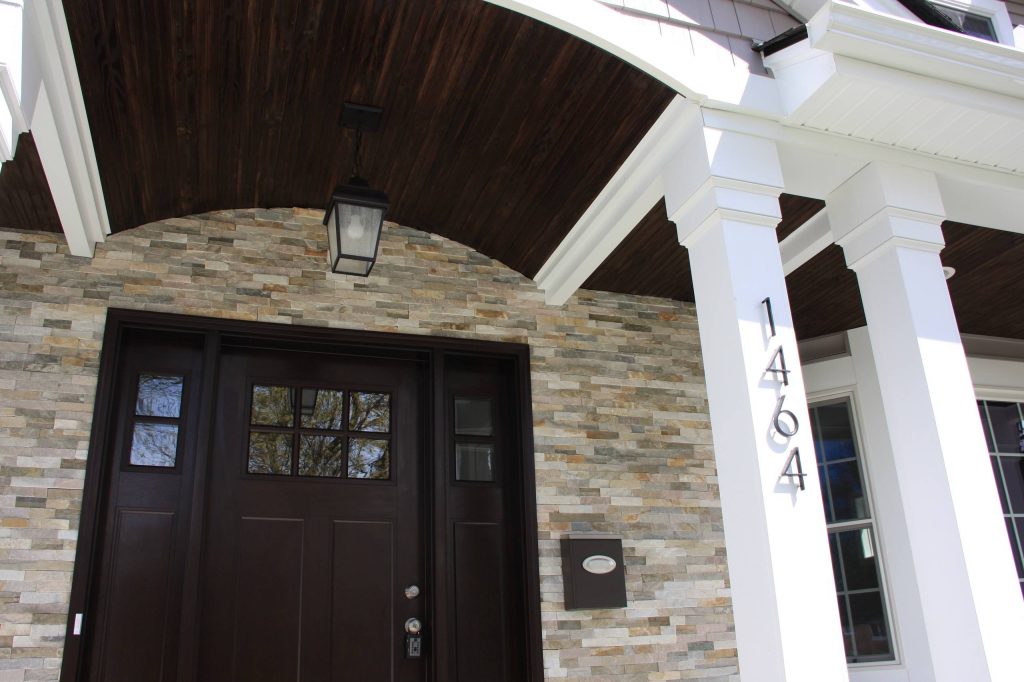 This is an example of a mid-sized traditional front porch design in Detroit. by Oliver Construction, Inc. | Outdoor Photos | Porch | Landscaping | Landscape Design | Outdoor Living Space | Porch Design Ideas | Outdoor Living Space Ideas | Backyard Design