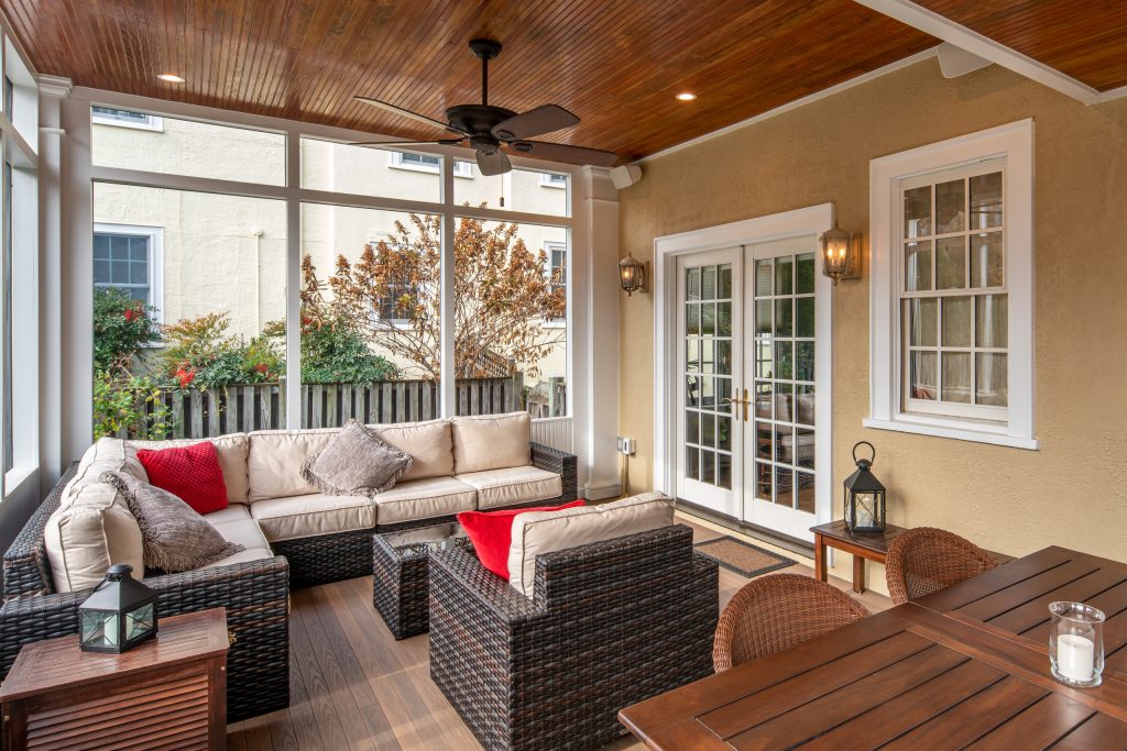 This is an example of a mid-sized traditional screened-in back porch design in DC Metro with decking and a roof extension. by Grossmueller's Design Consultants | Outdoor Photos | Porch | Landscaping | Landscape Design | Outdoor Living Space | Porch Design Ideas | Outdoor Living Space Ideas | Backyard Design