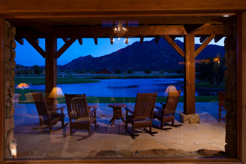 This is an example of a mid-sized traditional stone back porch design in Phoenix with a pergola. by ADORN Interiors | Outdoor Photos | Porch | Landscaping | Landscape Design | Outdoor Living Space | Porch Design Ideas | Outdoor Living Space Ideas | Backyard Design