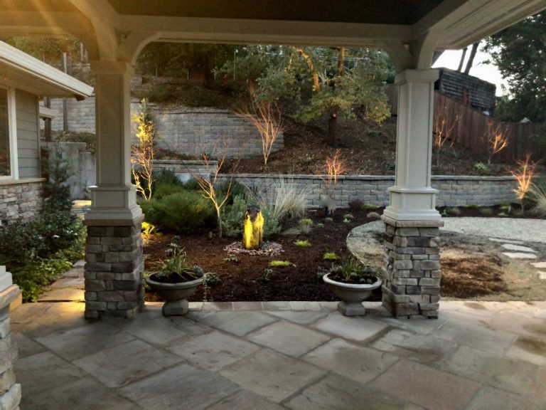 This is an example of a mid-sized traditional stone porch design in San Francisco with a roof extension. by Garden Lights Landscape and Pool Development Inc. | Outdoor Photos | Porch | Landscaping | Landscape Design | Outdoor Living Space | Porch Design Ideas | Outdoor Living Space Ideas | Backyard Design