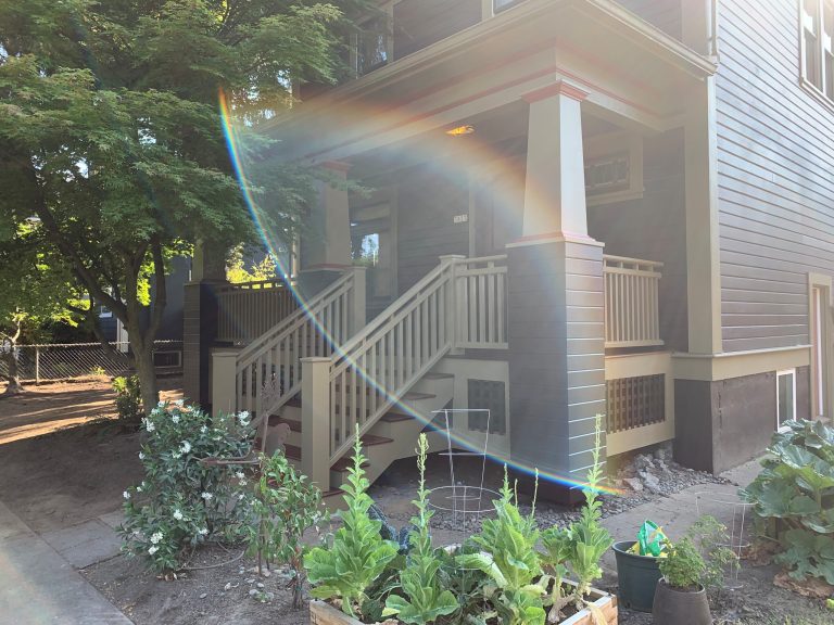 This is an example of a mid-sized traditional wood railing front porch design in Portland with a roof extension. by Porch Masters | Outdoor Photos | Porch | Landscaping | Landscape Design | Outdoor Living Space | Porch Design Ideas | Outdoor Living Space Ideas | Backyard Design