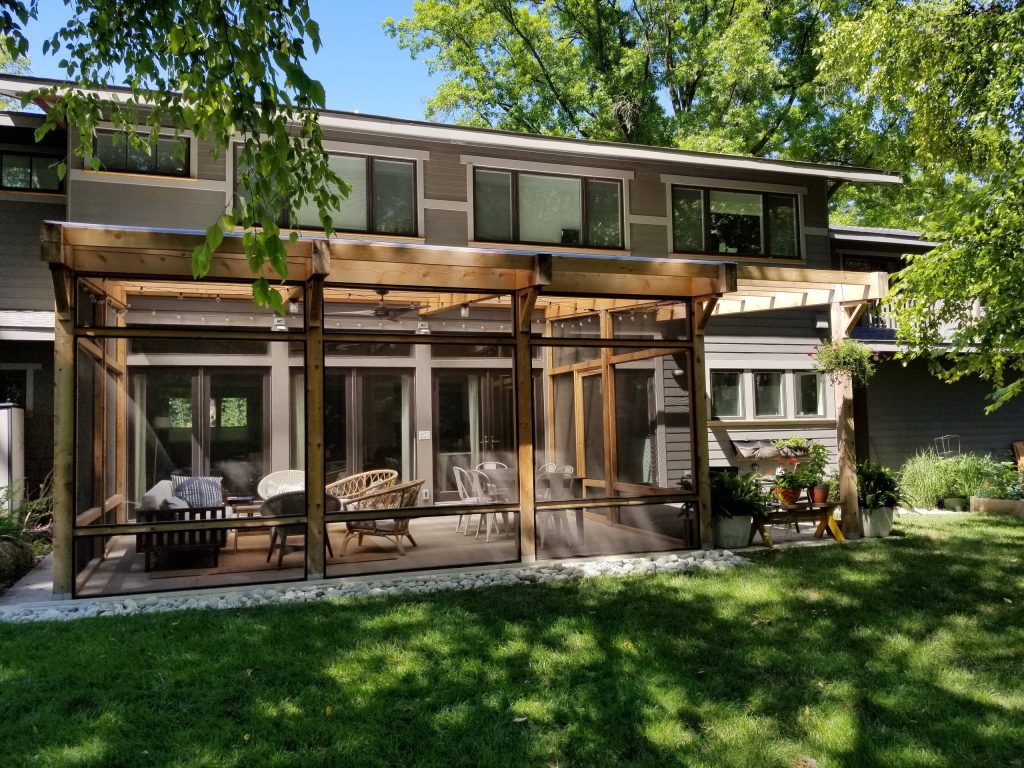 This is an example of a mid-sized transitional screened-in and wood railing back porch design in Kansas City with a pergola. by Meridian Construction Corp. | Outdoor Photos | Porch | Landscaping | Landscape Design | Outdoor Living Space | Porch Design Ideas | Outdoor Living Space Ideas | Backyard Design