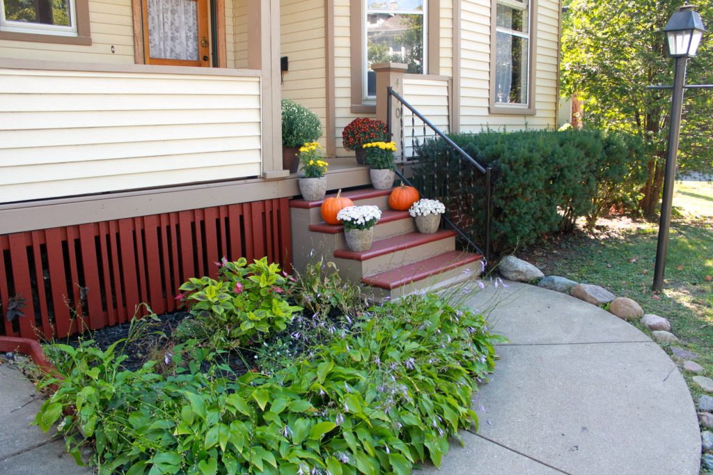 This is an example of a mid-sized victorian concrete porch design in Chicago with a roof extension. by Lucy's Trunk | Outdoor Photos | Porch | Landscaping | Landscape Design | Outdoor Living Space | Porch Design Ideas | Outdoor Living Space Ideas | Backyard Design