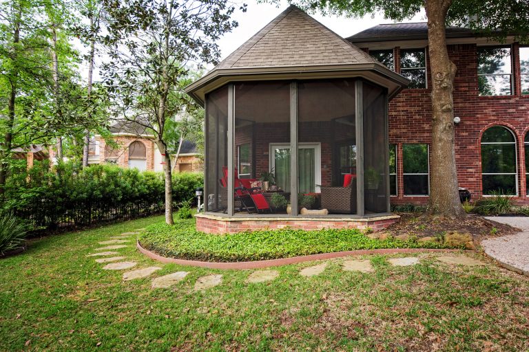 This is an example of a mid-sized victorian screened-in back porch design in Houston with a roof extension. by Outer Image Design | Outdoor Photos | Porch | Landscaping | Landscape Design | Outdoor Living Space | Porch Design Ideas | Outdoor Living Space Ideas | Backyard Design