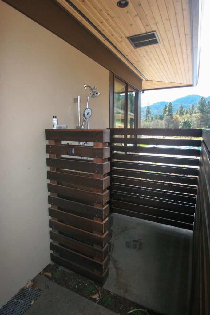 This is an example of a mid-sized transitional shade backyard landscaping in Other.