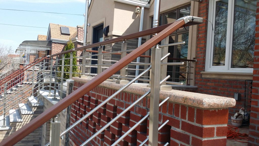 This is an example of a modern porch design in New York. by RailingCo | Outdoor Photos | Porch | Landscaping | Landscape Design | Outdoor Living Space | Porch Design Ideas | Outdoor Living Space Ideas | Backyard Design