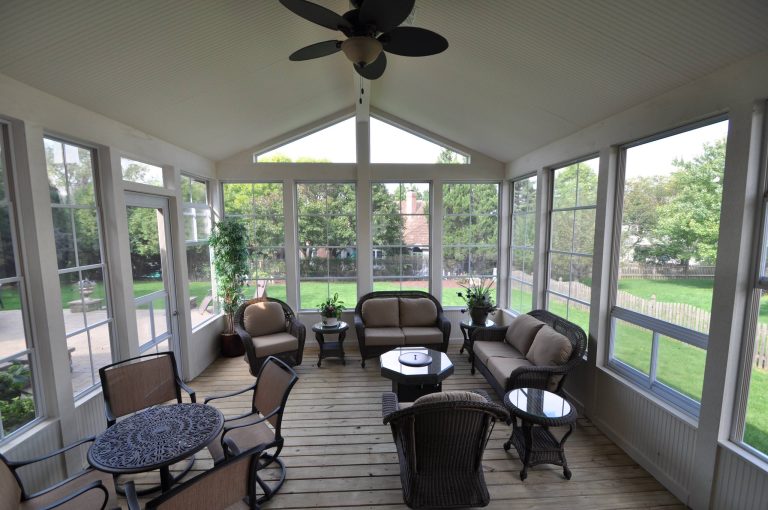 This is an example of a modern screened-in back porch design in Chicago with decking and a roof extension. by Tranquility Builders, Inc. | Outdoor Photos | Porch | Landscaping | Landscape Design | Outdoor Living Space | Porch Design Ideas | Outdoor Living Space Ideas | Backyard Design