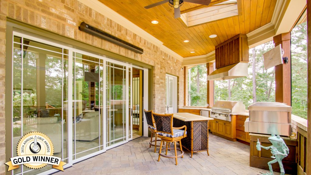 This is an example of a rustic porch design in Atlanta with a roof extension.