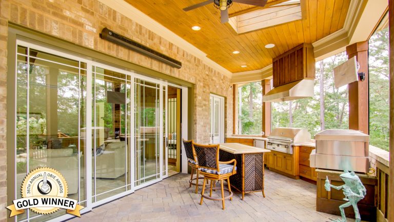 This is an example of a rustic porch design in Atlanta with a roof extension.