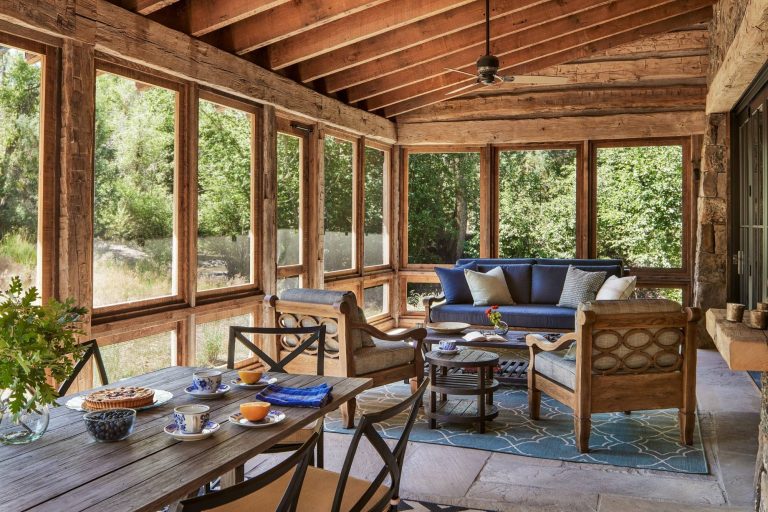 This is an example of a rustic screened-in porch design in Other with a roof extension. by Miller-Roodell Architects Ltd | Outdoor Photos | Porch | Landscaping | Landscape Design | Outdoor Living Space | Porch Design Ideas | Outdoor Living Space Ideas | Backyard Design