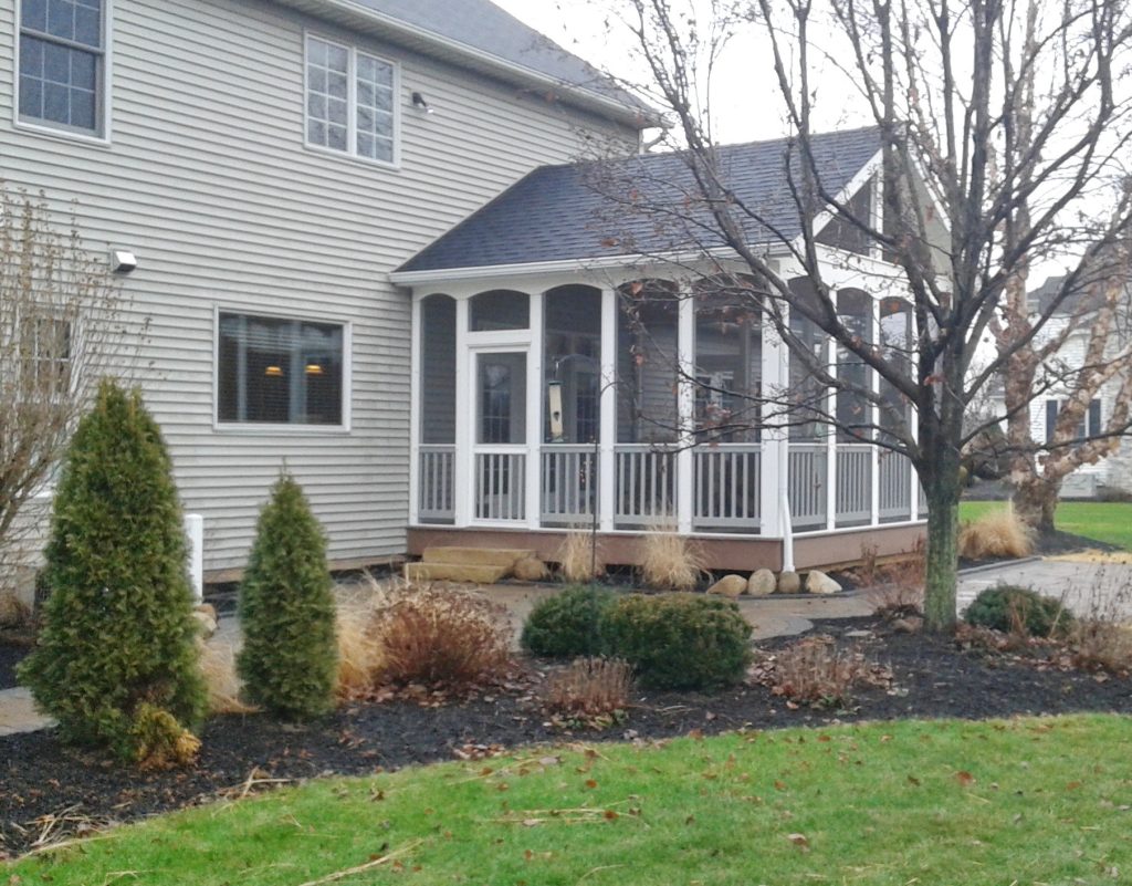 This is an example of a screened-in back porch design in Cleveland. by Tim Englert Construction, Inc. | Outdoor Photos | Porch | Landscaping | Landscape Design | Outdoor Living Space | Porch Design Ideas | Outdoor Living Space Ideas | Backyard Design