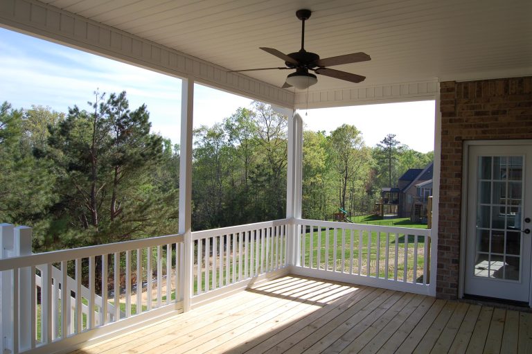 This is an example of a screened-in back porch design in Other with a roof extension. by ARENA Builders | Outdoor Photos | Porch | Landscaping | Landscape Design | Outdoor Living Space | Porch Design Ideas | Outdoor Living Space Ideas | Backyard Design