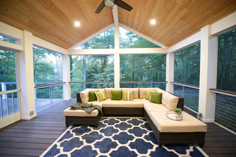 This is an example of a screened-in porch design in DC Metro with decking. by Phoenix Home Services | Outdoor Photos | Porch | Landscaping | Landscape Design | Outdoor Living Space | Porch Design Ideas | Outdoor Living Space Ideas | Backyard Design
