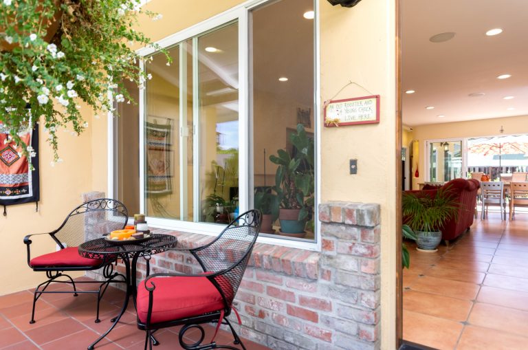 This is an example of a small eclectic tile front porch design in San Francisco with a roof extension. by Ayelet Designs | Outdoor Photos | Porch | Landscaping | Landscape Design | Outdoor Living Space | Porch Design Ideas | Outdoor Living Space Ideas | Backyard Design