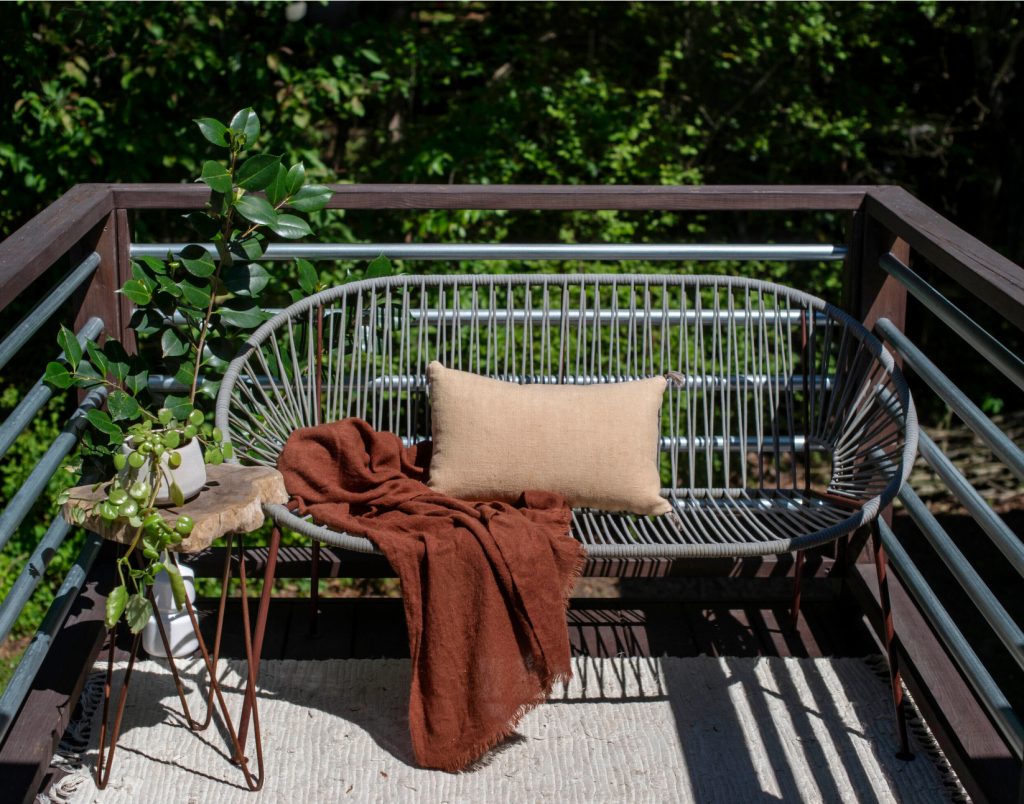 This is an example of a small modern metal railing back porch design in Raleigh. by Studio Evloh LLC Interior Architecture & Design | Outdoor Photos | Porch | Landscaping | Landscape Design | Outdoor Living Space | Porch Design Ideas | Outdoor Living Space Ideas | Backyard Design