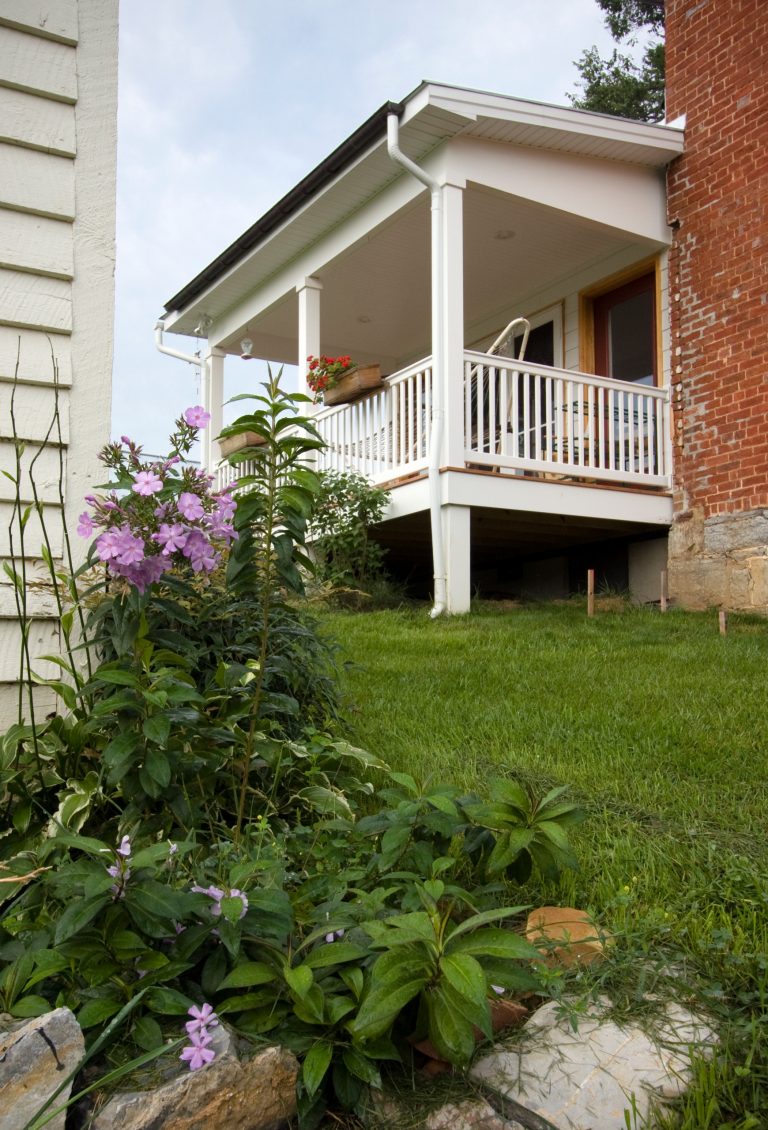 This is an example of a small porch design in Other with a roof extension. by Lineage Architects | Outdoor Photos | Porch | Landscaping | Landscape Design | Outdoor Living Space | Porch Design Ideas | Outdoor Living Space Ideas | Backyard Design