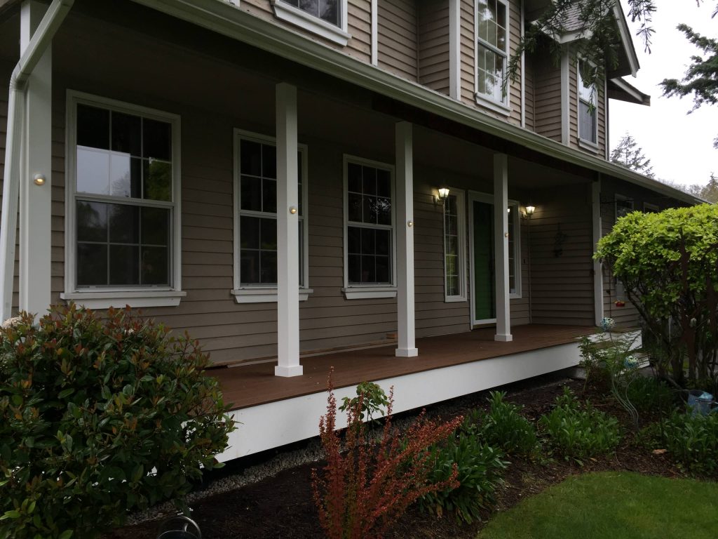 This is an example of a small traditional front porch design in Seattle with decking and a roof extension. by Chapman Construction, LLC | Outdoor Photos | Porch | Landscaping | Landscape Design | Outdoor Living Space | Porch Design Ideas | Outdoor Living Space Ideas | Backyard Design