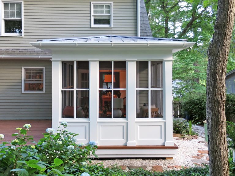 This is an example of a small traditional screened-in back porch design in Raleigh with decking and a roof extension. by CH Architects | Outdoor Photos | Porch | Landscaping | Landscape Design | Outdoor Living Space | Porch Design Ideas | Outdoor Living Space Ideas | Backyard Design