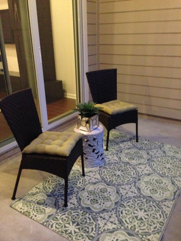 This is an example of a small transitional concrete screened-in back porch design in Jacksonville with a roof extension. by Watson Home Staging & Design, LLC | Outdoor Photos | Porch | Landscaping | Landscape Design | Outdoor Living Space | Porch Design Ideas | Outdoor Living Space Ideas | Backyard Design