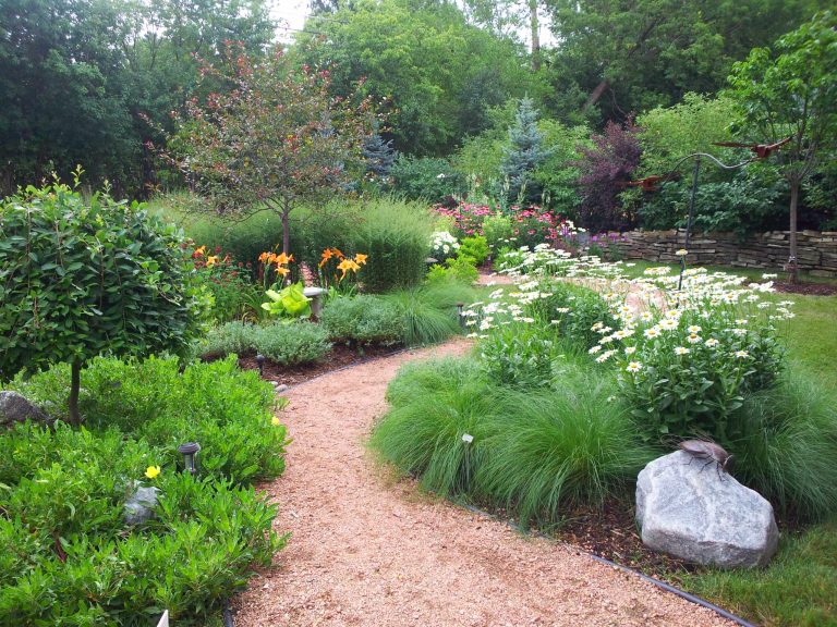 This is an example of a traditional backyard decomposed granite garden path in Milwaukee for fall.
