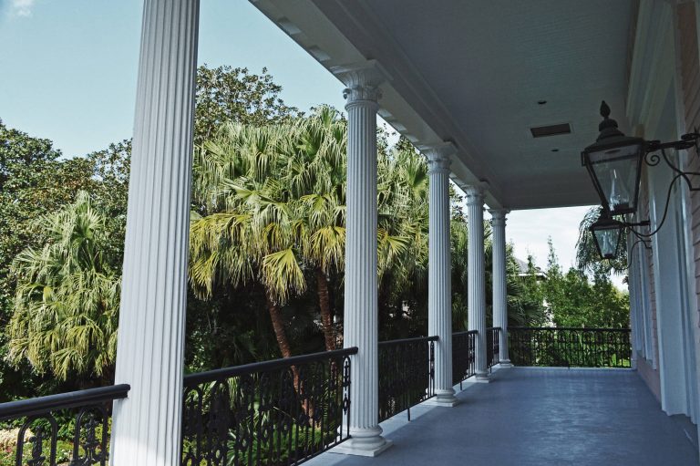 This is an example of a traditional brick front porch design in New Orleans. by Koch and Wilson Architects | Outdoor Photos | Porch | Landscaping | Landscape Design | Outdoor Living Space | Porch Design Ideas | Outdoor Living Space Ideas | Backyard Design