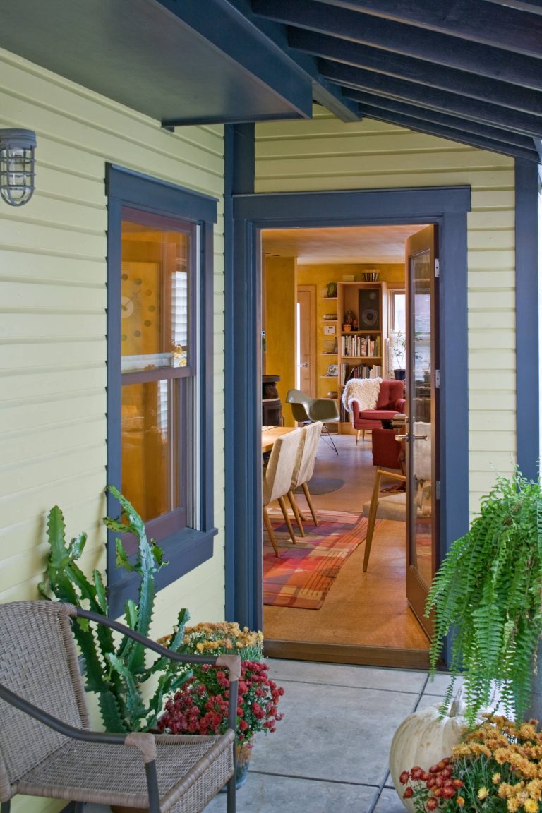 This is an example of a traditional concrete back porch design in Other with a roof extension. by Gerald Lee Morosco Architects, PC | Outdoor Photos | Porch | Landscaping | Landscape Design | Outdoor Living Space | Porch Design Ideas | Outdoor Living Space Ideas | Backyard Design
